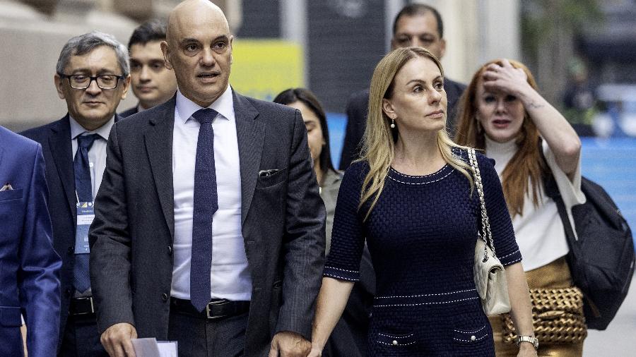 Alexandre de Moraes e Viviane Barci caminhando juntos